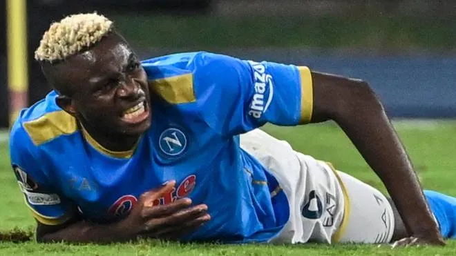 Napoli's Nigerian forward Victor Osimhen reacts after being tackled during the UEFA Europa League Group C football match between Napoli and Spartak Moscow on September 30, 2021 at the Diego-Maradona stadium in Naples. (Photo by Alberto PIZZOLI / AFP)