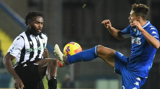 Udinese's foward Isaac Success (L) vies for the ball with Empoli's midfielder Samuele Ricci (R) during the Italian serie A soccer match between Empoli FC vs Udinese at Carlo Castellani Stadium in Empoli, Italy, 6 December 2021ANSA/CLAUDIO GIOVANNINI