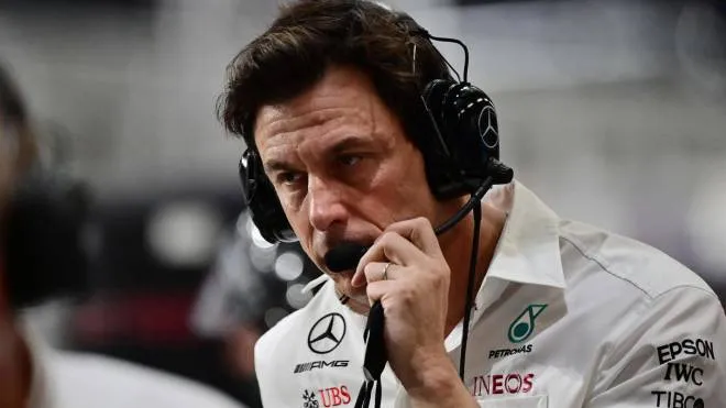 Mercedes AMG Petronas F1 Team's team principal Toto Wolff speaks on the intercom in the pits during the Formula One Saudi Arabian Grand Prix at the Jeddah Corniche Circuit in Jeddah on December 5, 2021. (Photo by ANDREJ ISAKOVIC / various sources / AFP)