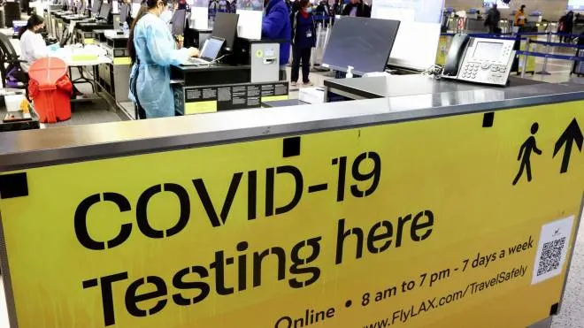 LOS ANGELES, CALIFORNIA - DECEMBER 01: A COVID-19 test center operates inside the Tom Bradley International Terminal at Los Angeles International Airport (LAX) on December 01, 2021 in Los Angeles, California. The Biden administration is planning to announce tighter restrictions for travelers flying into the United States, including requiring a negative test for COVID-19 one day ahead of travel, in response to the new Omicron variant.   Mario Tama/Getty Images/AFP
== FOR NEWSPAPERS, INTERNET, TELCOS & TELEVISION USE ONLY ==