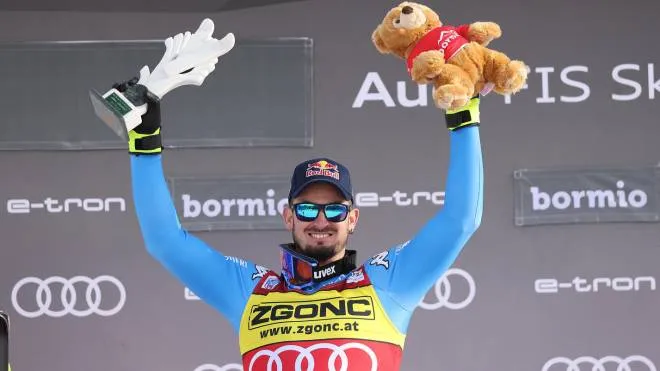 Winner Dominik Paris of Italy celebrates on the podium after the Men's Downhill race at the FIS Alpine Skiing World Cup in Bormio, Italy, 28 December 2021. ANSA/ANDREA SOLERO