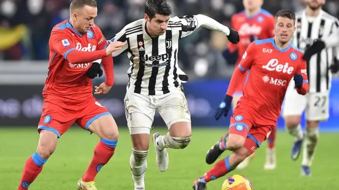 Juventus� Alvaro Morata and Napoli�s Stanislav Lobotka in action during the italian Serie A soccer match Juventus FC vs SSC Napoli at the Allianz Stadium in Turin, Italy, 6 January 2022 ANSA/ALESSANDRO DI MARCO