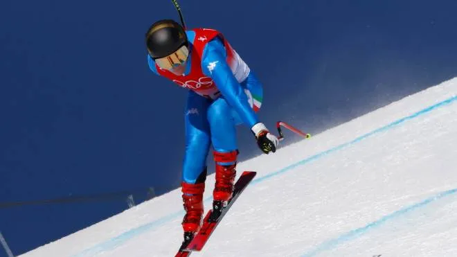 epa09754959 Sofia Goggia of Italy competes in women's downhill training at the Beijing 2022 Olympic Games at the Yanqing National Alpine Ski Centre Skiing, Beijing municipality, China, 14 February 2022.  EPA/Guillaume Horcajuelo