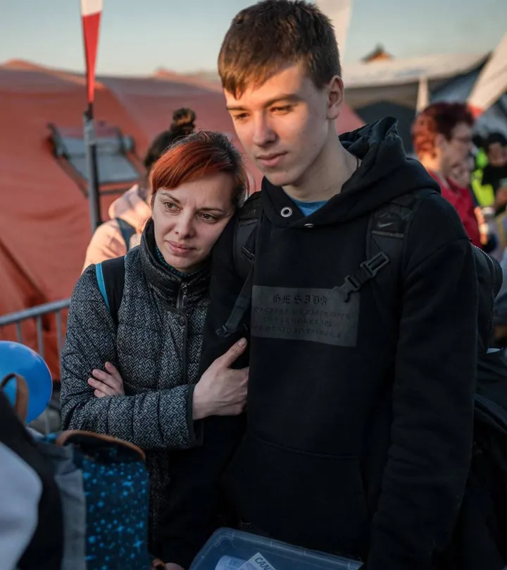 Profughi ucraini al confine polacco in attesa di essere ammessi