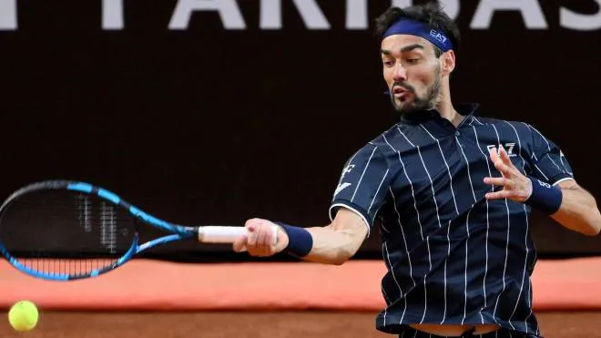 Fabio Fognini of Italy in action against Dominic Thiem of Austria during their men's singles first round match at the Italian Open tennis tournament in Rome, Italy, 09 May 2022.  ANSA/ETTORE FERRARI