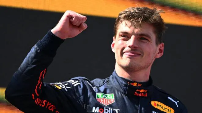 Red Bull's Dutch driver Max Verstappen celebrates on the podium after the Spanish Formula One Grand Prix at the Circuit de Catalunya on May 21, 2022 in Montmelo, on the outskirts of Barcelona. (Photo by GABRIEL BOUYS / AFP)