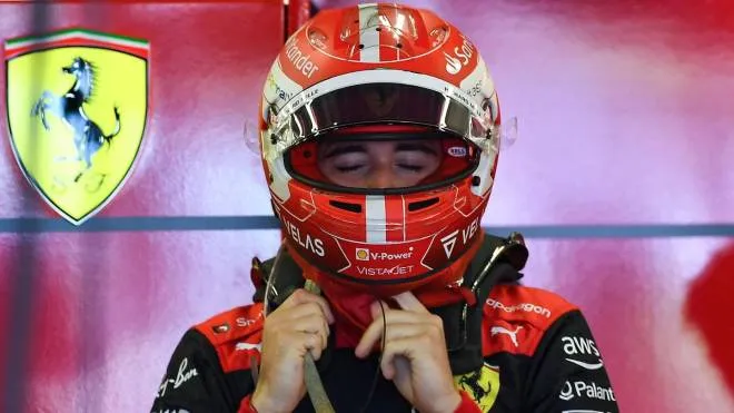 Ferrari's Monegasque driver Charles Leclerc gets ready for the Formula One Azerbaijan Grand Prix at the Baku City Circuit in Baku on June 12, 2022. (Photo by NATALIA KOLESNIKOVA / AFP)