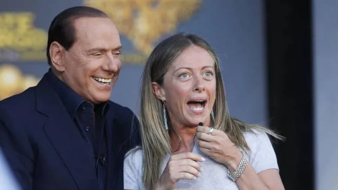 Il Presidente del Consiglio SIlvio Berlusconi ospite di Atreju, con il ministro della Gioventu', Giorgia Meloni,  oggi 9 settembre 2011 a Roma. ANSA/ALESSANDRO DI MEO