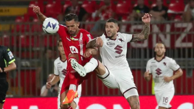 Torino FC's  forward Antonio Sanabria in action against AC Monza's defender Pablo Mar� during the Italian Serie A soccer match between AC Monza and Torino FC at U-Power Stadium in Monza, Italy, 13 August 2022. ANSA / ROBERTO BREGANI