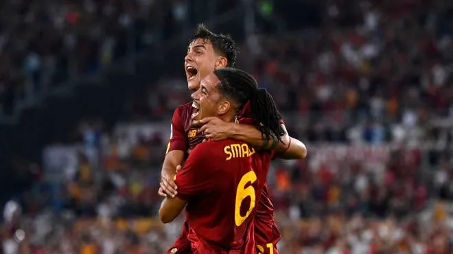 Roma�s Chris Smalling (R) celebrates his goal  with Roma�s Paulo Dybala (L) during the Serie A soccer match between AS Roma and US Cremonese at the Olimpico stadium in Rome, Italy, 22 August 2022. ANSA/RICCARDO ANTIMIANI