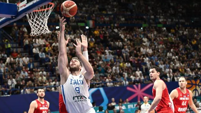 Italy�s Nicolo' Melli goes for the basket during the FIBA EuroBasket 2022 group C stage match between Italy and Croatia at the Assago Forum, in Assago, near Milan, Italy 6 September 2022. ANSA/DANIEL DAL ZENNARO