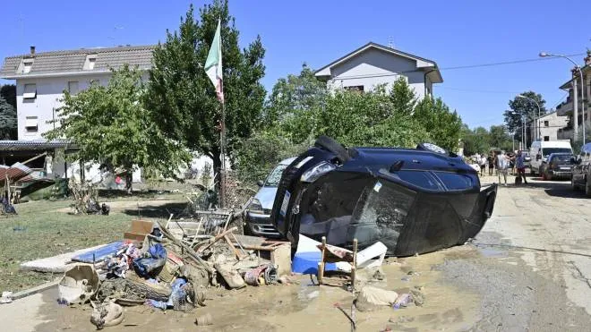 A car destoyed after  flooded by the rain bomb in Pianello di Ostra, Ancona province, central Italy, 16 September 2022. At least 10 people died and four were missing after violent storms lashed central Italy, reports said Friday, pushing the issue of climate change up the agenda the week before elections.
ANSA/ALESSANDRO DI MEO