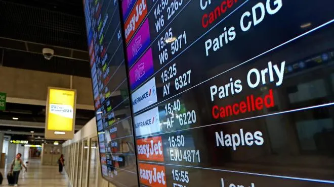epa10187698 A departure board indicates cancelled flights at Nice Cote d'Azur airport, in Nice, France, 16 September 2022. Several flights are canceled due to a strike by air traffic controllers in France.  EPA/SEBASTIEN NOGIER