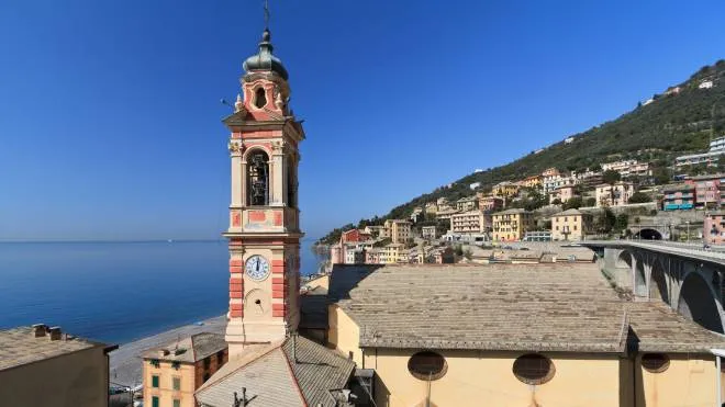 "the church and the village of Sori, small town in Liguria, Italy"