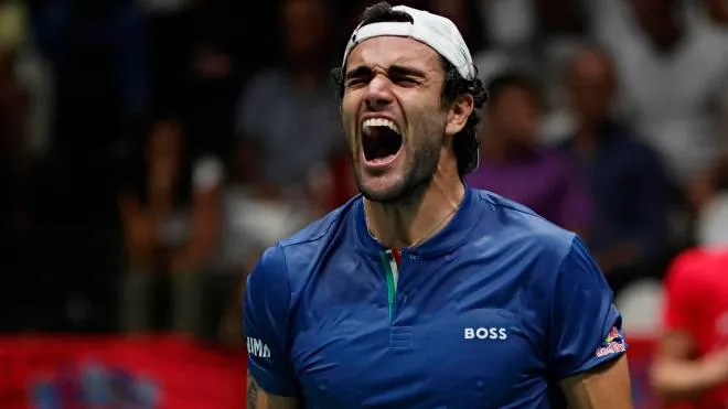Italian tennis player  Matteo Berrettini juibilates after winning the match against Croatian player Borna Coric during Davis Cup by Rakuten Final Group Stage A at Unipol Arena in Casalecchio (Bologna) Italy, 14 September 2022. ANSA /ELISABETTA BARACCHI