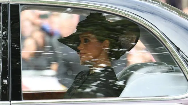 Meghan, the Duchess of Sussex during the State Funeral Procession of Queen Elizabeth II in London, Britain, 19 September 2022.  Britain's Queen Elizabeth II died at her Scottish estate, Balmoral Castle, on 08 September 2022. The 96-year-old Queen was the longest-reigning monarch in British history. ANSA/TOLGA AKMEN