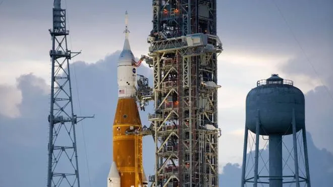epa10151290 A handout picture made available by the National Aeronautics and Space Administration (NASA) shows NASA�?s Space Launch System (SLS) rocket with the Orion spacecraft aboard at sunset atop the mobile launcher at Launch Pad 39B as preparations for launch continue, at NASA�?s Kennedy Space Center in Merrit Island, Florida, USA, 31 August 2022. NASA�?s Artemis I flight test is the first integrated test of the agency�?s deep space exploration systems: the Orion spacecraft, SLS rocket, and supporting ground systems. Launch of the uncrewed flight test is targeted for 03 September at 2:17 p.m. EDT.  Photo Credit: (NASA/Joel Kowsky)  EPA/Joel Kowsky / HANDOUT MANDATORY CREDIT: (NASA/Joel Kowsky) HANDOUT EDITORIAL USE ONLY/NO SALES