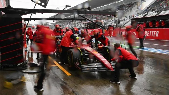 Ferrari's Spanish driver Carlos Sainz Jr makes a pit stop during the first practice session ahead of the Formula One Japanese Grand Prix at Suzuka, Mie prefecture on October 7, 2022. (Photo by Philip FONG / AFP)