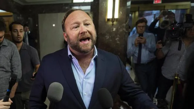 epa06998919 Radio host and conspiracy theorist Alex Jones speaks to the media outside of a Senate Intelligence Committee hearing with CEO of Twitter Jack Dorsey and COO of Facebook Sheryl Sandberg in the Dirksen Senate Office Building in Washington, DC, USA, 05 September 2018. Jones claimed that the White House woulds soon issue executive orders limiting social media.  EPA/JIM LO SCALZO