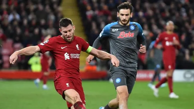 epa10279850 Liverpool's James Milner (L) in action against Napoli's Khvicha Kvaratskhelia (R) during the UEFA Champions League group A soccer match between Liverpool FC and SSC Napoli in Liverpool, Britain, 01 November 2022.  EPA/PETER POWELL