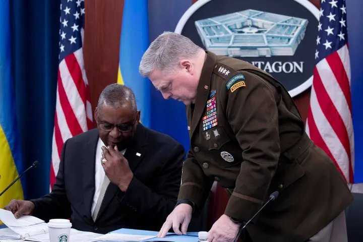epa10308700 US Secretary of Defense Lloyd Austin (L) and US Chairman of the Joint Chiefs of Staff Mark Milley (R) participate in a virtual meeting of the Ukraine Defense Contact Group, at the Pentagon in Arlington, Virginia, USA, 16 November 2022. During opening remarks Secretary of Defense Austin discussed the situation of Russia's invasion of Ukraine and a rocket explosion in Poland.  EPA/MICHAEL REYNOLDS