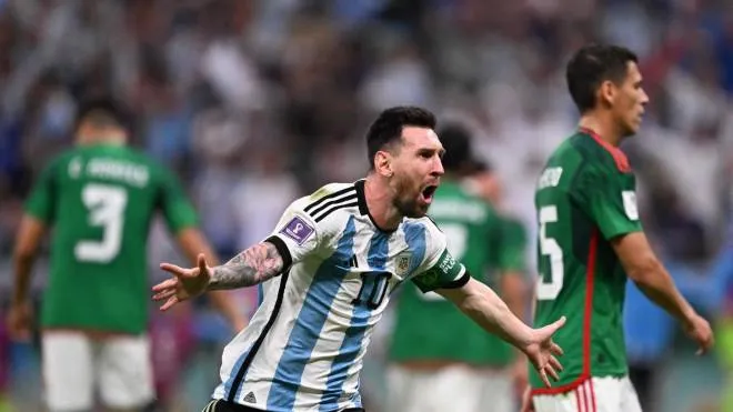 Argentina's forward #10 Lionel Messi celebrates scoring the opening goal during the Qatar 2022 World Cup Group C football match between Argentina and Mexico at the Lusail Stadium in Lusail, north of Doha on November 26, 2022. (Photo by Kirill KUDRYAVTSEV / AFP)