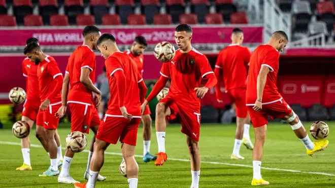 epa10363745 Players of Morocco attend their team's training session in Doha, Qatar, 13 December 2022. Morocco will face France in their FIFA World Cup 2022 semi final soccer match on 14 December 2022.  EPA/MARTIN DIVISEK