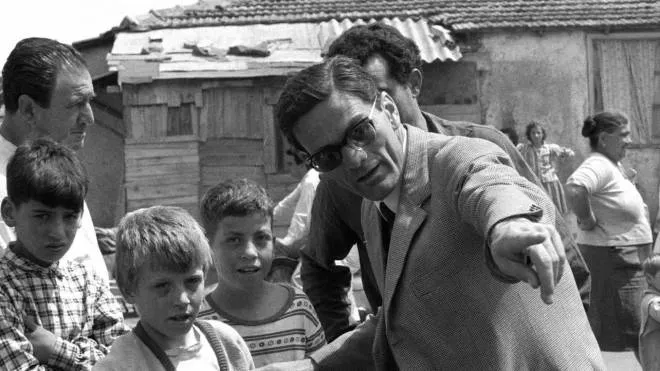 epa000428587 (FILES) A file photo dated 1960 showing late Italian writer, poet and movie director Pier Paolo Pasolini, who was killed on 02 November 1975, on the set of his film 'Accattone'. After some 30 years, on Saturday 05 May 2005, Italian press gave ample coverage to the claim by Pino 'The Frog' Pelosi that Pasolini was beaten to death by a group of tugs who wanted to 'teach him a lesson'. Pelosi, now 46, made the statements in a TV interview which will be aired overnight. Judicial sources said that any decision to reopen the case could only be taken into consideration after examining the full text of the interview. They added that the statements quoted in today's press were too vague to justify reopening the case. Pelosi, a one-time rent boy, immediately confessed to the November 1975 murder saying that the director had tried to play the dominant role in a homosexual act and he had defended himself and by accident had driven over Pasolini while stealing his car.  EPA/ANSA FILES