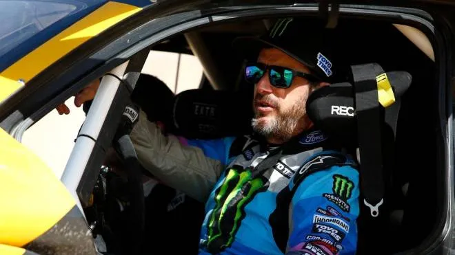 (FILES) In this file photo taken on January 17, 2020, legendary off-road racer and YouTube star Ken Block prepares to take the wheel of Extreme E�s E-SUV to take part in the Grand Prix of Qiddiya finale of the Dakar 2020. - The American rally driver Ken Block, a YouTube star best known for his spectacular demonstrations at the wheel of cars in urban environments, was killed while riding a snowmobile in Utah, his sports team announced on December 2, 2023. (Photo by FRANCK FIFE / AFP)