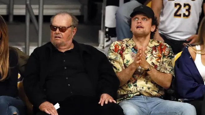 epa07485963 US actor Jack Nicholson (L) and his son US actor Ray Nicholson (R) react as they attend the NBA basketball game between the Los Angeles Lakers and the Golden State Warriors at the Staples Center Stadium in Los Angeles, California, USA, 04 April 2019.  EPA/ETIENNE LAURENT SHUTTERSTOCK OUT