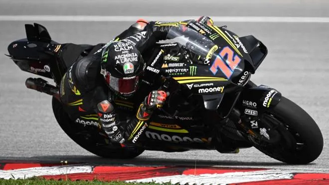 Mooney VR46 Racing's Italian rider Marco Bezzecchi takes a corner during the first day of the pre-season MotoGP winter test at the Sepang International Circuit in Sepang on February 10, 2023. (Photo by Mohd RASFAN / AFP)