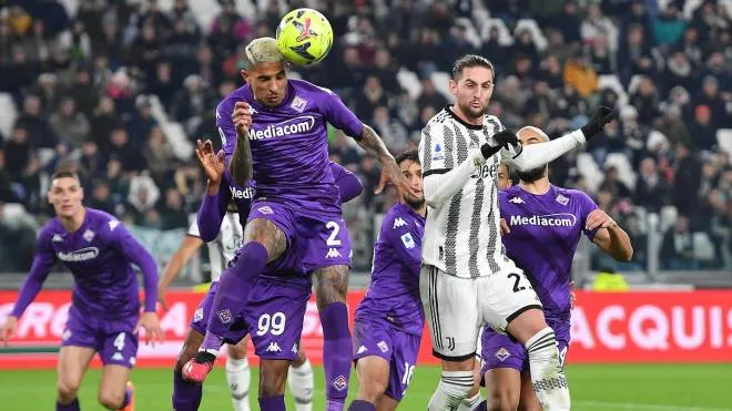 Juventus' Adrien Rabiot and Fiorentina's Dod� in action during the italian Serie A soccer match Juventus FC vs ACF Fiorentina at the Allianz Stadium in Turin, Italy, 12 february 2023 ANSA/ALESSANDRO DI MARCO
