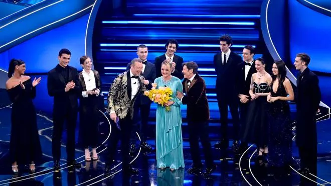 Cast/members of the tv series 'Mare Fuori' with Italian actress Carolina Crescentini and Italian singer and Sanremo Festival co-host Gianni Morandi and Sanremo Festival host and artistic director Amadeus on stage at the Ariston theatre during the 73rd Sanremo Italian Song Festival, in Sanremo, Italy, 10 February 2023. The music festival will run from 07 to 11 February 2023. ANSA/RICCARDO ANTIMIANI