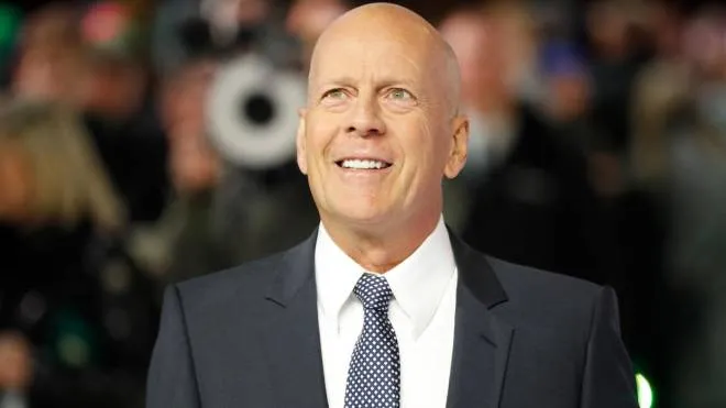 (FILES) In this file photo taken on January 09, 2019 US actor Bruce Willis poses on arrival for the European premiere of Glass in central London. - Willis has been diagnosed with dementia, his family said Thursday, less than a year after he retired from acting because of growing cognitive difficulties. (Photo by Tolga AKMEN / AFP)