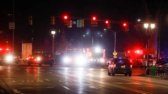 LANSING, MI - FEBRUARY 13: Police and emergency vehicles are on the scene of an active shooter situation on the campus of Michigan State University on February 13, 2023 in Lansing, Michigan. Five people were shot and the gunman still at large following the attack, according to published reports. The reports say some of the victims have life-threatening injuries.   Bill Pugliano/Getty Images/AFP (Photo by BILL PUGLIANO / GETTY IMAGES NORTH AMERICA / Getty Images via AFP)