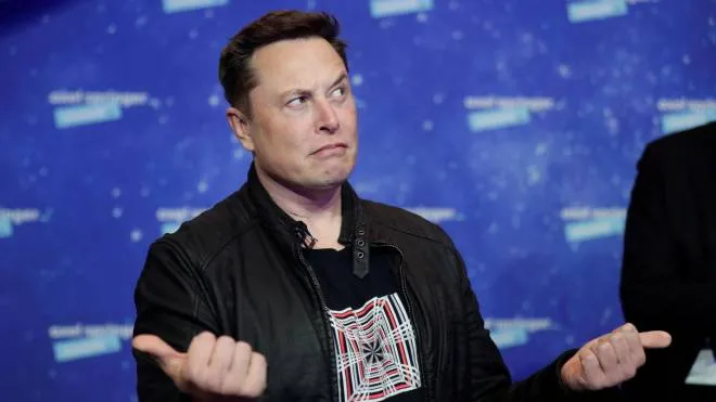 SpaceX owner and Tesla CEO Elon Musk poses after arriving on the red carpet for the Axel Springer award, in Berlin, Germany, 01 December 2020. ANSA/HANNIBAL HANSCHKE / POOL