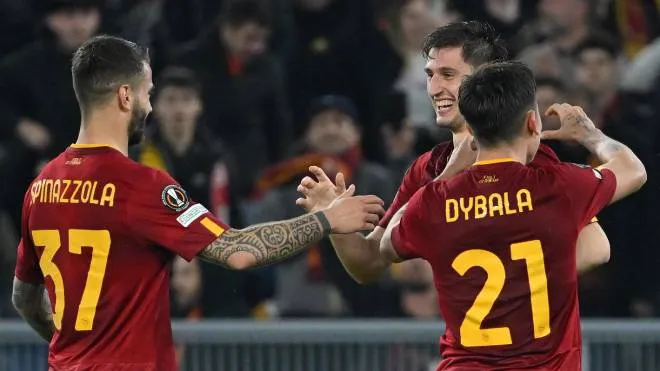 AS Roma's Marash Kumbulla (C) celebrates with his teammates after scoring the 2-0 goal during the UEFA Europa League round of 16 first leg soccer match between AS Roma and Real Sociedad at Olimpico stadium in Rome, Italy, 09 March 2023.  ANSA/ETTORE FERRARI