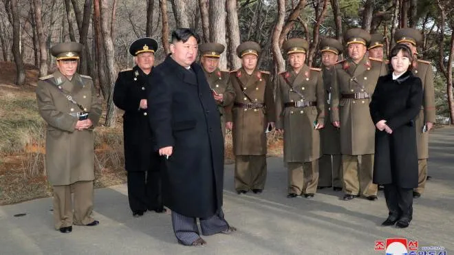 epa10512828 A photo released by the official North Korean Central News Agency (KCNA) shows Supreme Leader Kim Jong Un (3-L) and his daughter Kim Ju-ae (R) at an artillery drill in an undisclosed location in North Korea, 09 March 2023 (issued 10 March 2023). According to KCNA, Supreme Leader Kim Jong Un 'gave field guidance' at the 'fire assault drill' by the Hwasong artillery unit of the Korean People's Army.  EPA/KCNA   EDITORIAL USE ONLY