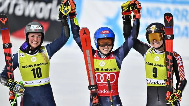epa10531656 (L-R) Second placed Thea Louise Stjernesund of Norway, winner Mikaela Shiffrin of the United States and third placed Valerie Grenier of Canada react in the finish area after the second run of the women's giant slalom race at the FIS Alpine Skiing World Cup finals in the skiing resort of El Tarter, Andorra, 19 March 2023.  EPA/JEAN-CHRISTOPHE BOTT