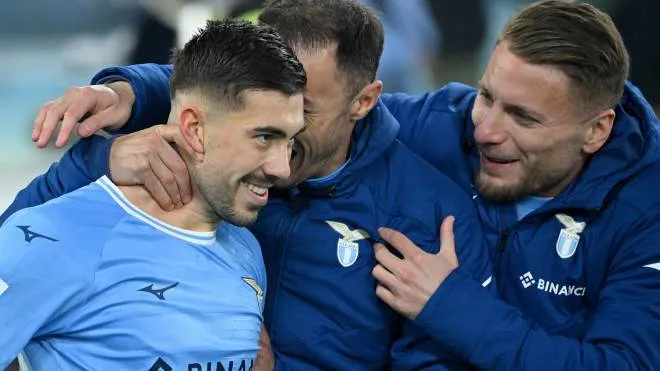 SS Lazio's Mattia Zaccagni (L) celebrates with his teammates after scoring the 1-0 goal during the Italian Serie A soccer match between SS Lazio and AS Roma at the Olimpico stadium in Rome, Italy, 19 March 2023.  ANSA/ETTORE FERRARI