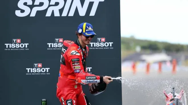 Italian MotoGP rider Francesco Bagnaia of Ducati Lenovo Team celebrates after winning the sprint race at Algarve International race track, Portimao, Portugal, 25 March 2023. The Motorcycling Grand Prix of Portugal will take place on 26 March 2023.  ANSA/NUNO VEIGA