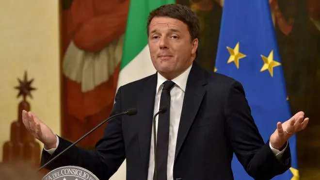Italy's Prime Minister Matteo Renzi gives a press conference at the Palazzo Chigi after the results of the vote for a referendum on constitutional reforms, on December 4, 2016 in Rome. Italy's Prime Minister Matteo Renzi announced his resignation after losing a referendum on constitutional reform. "My experience of government finishes here," Renzi told a press conference after the No campaign won what he described as an "extraordinarily clear" victory in the referendum on which he had staked his future.
 / AFP PHOTO / Andreas SOLARO