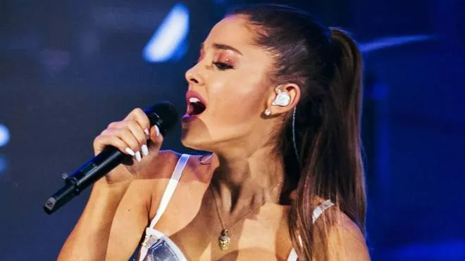 epa05982699 (FILE) - US singer Ariana Grande performs during a television program in Hilversum, The Netherlands, 14 November 2014 (reissued 23 May 2017). According to a statement released by the Greater Manchester Police on 23 May 2017, police responded to reports of an explosion at Manchester Arena in Manchester, Britain, on 22 May 2017 evening. At least 19 people have been confirmed dead and around 50 others were injured, authorities said. The happening is currently treated as a terrorist incident until police know otherwise. According to reports quoting witnesses, a mass evacuation was prompted after explosions were heard at the end of US singer Ariana Grande's concert in the arena. The US singer commented on the incident saying she is 'broken,' adding 'I don't have words.'  EPA/REMKO DE WAAL