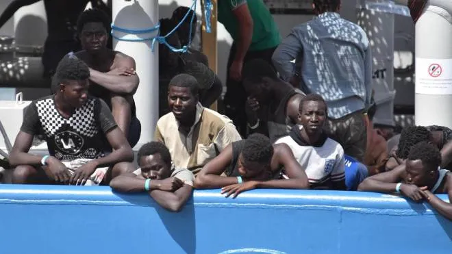 650 migrants, rescued in Mediterranean Sea off the Libyan coast, ready to disembark from Swedish ship Frontex in Catania, 1 July 2017. Nine migrants are found dead. ANSA/ORIETTA SCARDINO