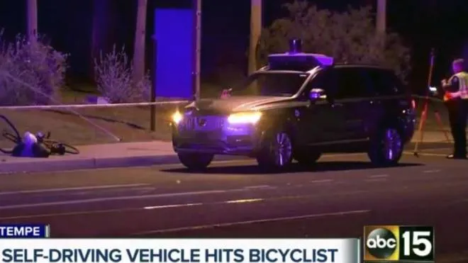This March 19, 2018 still image taken from video provided by ABC-15, shows investigators at the scene of a fatal accident involving a self driving Uber car on the street in Tempe, Ariz. Police in the city of Tempe said Monday, March 19, 2018, that the vehicle was in autonomous mode with an operator behind the wheel when the woman walking outside of a crosswalk was hit. (ABC-15.com via AP)