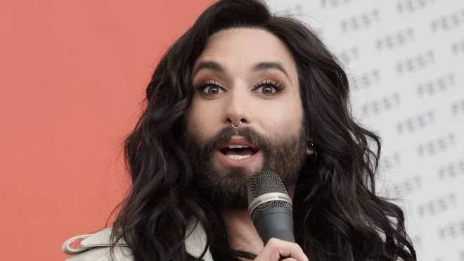 (FILES) This file photo taken on May 9, 2017 shows Austrian singer and drag queen Conchita Wurst (known as Conchita) attending a press conference of  the Wiener Fest Wochen 2017 cultural festival  in Vienna, Austria. 
With a wave of films, television series and art shows championing "gender fluidity" -- and catwalks awash with "gender neutral" models and clothes -- the old dividing line between the sexes is being increasingly called into question. On the catwalks of Paris, New York and Milan, brands now regularly show "mixed" collections and many market their clothes as "gender fluid". 
Philosopher Thierry Hoquet calls this the "Conchita Wurst phenomenon", after the bearded Austrian drag queen who won the Eurovision Song Contest in 2014.
 / AFP PHOTO / JOE KLAMAR