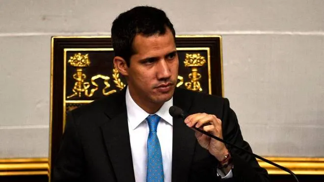Venezuelan opposition leader and self-proclaimed acting president Juan Guaido speaks during a session of the Venezuelan National Assembly on March 11, 2019. - Venezuela's opposition leader Juan Guaido will ask lawmakers on Monday to declare a &quot;state of alarm&quot; over the country's devastating blackout in order to facilitate the delivery of international aid -- a chance to score points in his power struggle with President Nicolas Maduro. (Photo by Federico Parra / AFP)