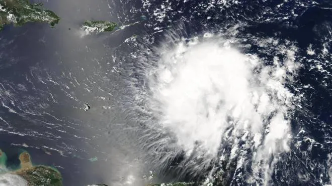 epa07798528 A handout photo made available by NASA shows a visible image acquired from the MODIS instrument aboard NASA's Terra Satellite of Tropical Storm Dorian as it approaches the east coast of Puerto Rico, 27 August 2019 (issued 28 August 2019). Tropical Storm Dorian is expected to reach hurricane strength after making landfall on Puerto Rico on 28 August.  EPA/NASA GODDARD MODIS RAPID RESPONSE / HANDOUT  HANDOUT EDITORIAL USE ONLY/NO SALES