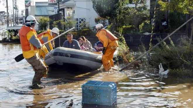 epa07917695 Rescue works are underway in flooded areas in Date, Fukushima prefecture, Japan, 13 October 2019. According to latest media reports, at least 26 people have died and more than 20 are missing after powerful typhoon Hagibis hit Japan provoking landslides and rivers overflowing  across the country.  EPA/JIJI PRESS JAPAN OUT EDITORIAL USE ONLY/  NO ARCHIVES  NO ARCHIVES  NO ARCHIVES