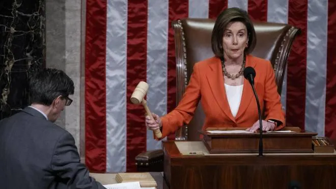 epa07962663 Speaker of the House Nancy Pelosi (R) presides over the House vote on a resolution formalizing the impeachment inquiry on the House floor in the US Capitol in Washington, DC, USA, 31 October 2019. The resolution passed 232-196.  EPA/SHAWN THEW
